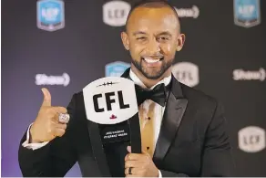  ?? PETER POWER/THE CANADIAN PRESS ?? Toronto Argonauts defensive back Matt Black, recipient of the Jake Gaudaur Veterans’ Award, is among a group of CFL players and personnel visiting Canadian troops in Ukraine and France.