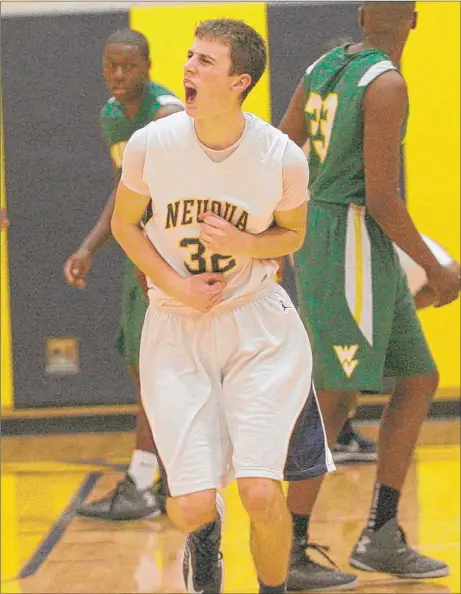  ??  ?? Neuqua Valley’s Connor Raridon celebrates after scoring the go-ahead three-pointer Friday.
| MIKE MANTUCCA~FOR SUN-TIMES MEDIA