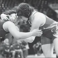  ?? BEA AHBECK/NEWS-SENTINEL ?? Lodi's Anna Rodriguez wrestles Chavez' Taydem Khamjoi during their 131 pound match during the Sac-Joaquin Section Wrestling Masters Tournament at Stockton Arena on Saturday.