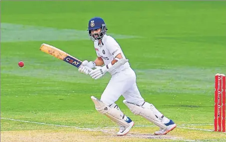  ??  ?? India's Ajinkya Rahane steers a ball away on the second day of the second Test against Australia in Melbourne on Sunday.