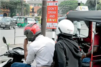  ??  ?? Safe-driving notices were placed in Colombo city during the festive season. Pic by Indika Handuwala