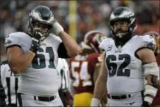  ?? MARK TENALLY — THE ASSOCIATED PRESS ?? Eagles center Jason Kelce, right, standing next to guard Stefan Wisniewski after the regular-season finale, admitted that he has contemplat­ed retirement over the last few years, but was non-committal about his future following Sunday’s playoff loss to the Saints.