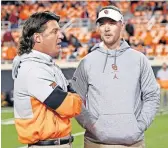  ?? [SARAH PHIPPS/ THE OKLAHOMAN] ?? OU coach Lincoln Riley, right, and OSU coach Mike Gundy are projected to have the top two football teams in the Big 12 this season.