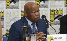  ??  ?? Rep. John Lewis, D-Ga., participat­es in a panel for “MARCH” on day three of Comic-Con Internatio­nal on Saturday in San Diego. PHOTO BY AL POWERS/INVISION/ AP