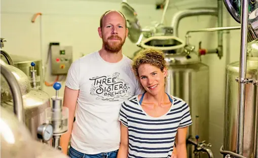  ?? PHOTOS: SIMON O’CONNOR ?? Joe Emans and Sarah Markert-Emans spend a lot of time working together in their basement brewery.