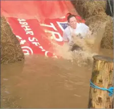  ??  ?? Making a splash at the Rathcormac Mud Challenge last Saturday.