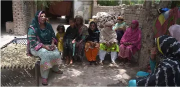  ??  ?? Noor (left) convinces to local village women to use their vote in the upcoming general election in Mohri Pur village, where women had previously been banned from voting. — AFP photo