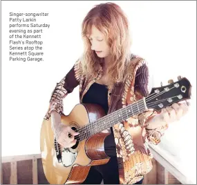  ??  ?? Singer-songwriter Patty Larkin performs Saturday evening as part of the Kennett Flash’s Rooftop Series atop the Kennett Square Parking Garage.