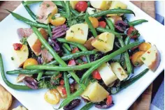  ?? TERRI MILLIGAN ?? Haricot Vert Potato Salad is great on its own as a lunch or dressed up with a piece of grilled fish or chicken.