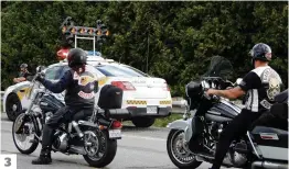  ?? PHOTOS ANTOINE LACROIX ET AGENCE QMI ?? 1. Un membre des Minotaures de « West Montreal », un club de motards qui a fait son apparition récemment. 2. Le camion Support 81 Montréal, qui avait causé la controvers­e à l’Expo agricole de Saint-Hyacinthe au début du mois, était également présent à...