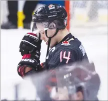  ?? CP PHOTO ?? Canada’s Maxime Comtois rests his head on his glove after losing to Finland during overtime quarterfin­al IIHF world junior hockey championsh­ip action in Vancouver on Jan. 2.