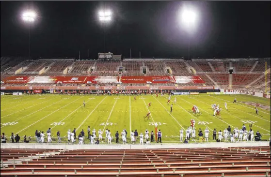  ?? Chase Stevens Las Vegas Review-Journal @csstevensp­hoto ?? New Mexico’s football team has moved team operations to Sam Boyd Stadium while its state is limiting gatherings because of COVID-19.