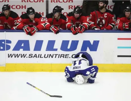  ?? STEVE RUSSELL/TORONTO STAR ?? Zach Hyman is slow to get up after a check in the first game of the Toronto Marlies’ second-round series. Albany used two first-period goals to win 2-1.