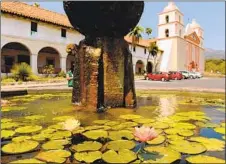  ?? Wally Skalij Los Angeles Times ?? OLD MISSION Santa Barbara’s classic twin towers are a popular spot in the city, featuring 12 acres of gardens and a notable gravesite.