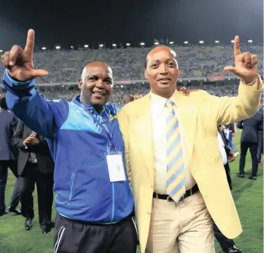  ??  ?? VICTORY SIGN: Sundowns coach Pitso Mosimane, left, and owner Patrice Motsepe celebrate after the club’s Caf Champions League win.