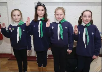  ??  ?? Newly invested cubs Aisling Linehan, Zoe O’ Connor, Emma Higgins and Jacqueline Breen enjoying the Kanturk Scouts investitur­e evening.