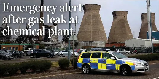  ??  ?? Incident: A police car at the Ineos petrochemi­cal plant at Grangemout­h, which was evacuated after a gas leak yesterday