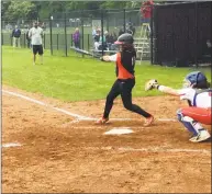  ?? David Fierro / Hearst Connecticu­t Media ?? Ridgefield’s Skylar Arent drives in two runs with a hit against Greenwich in the Class LL tournament. The Cardinals held a 12-10 lead in the bottom of the sixth when play was suspended due to rain.