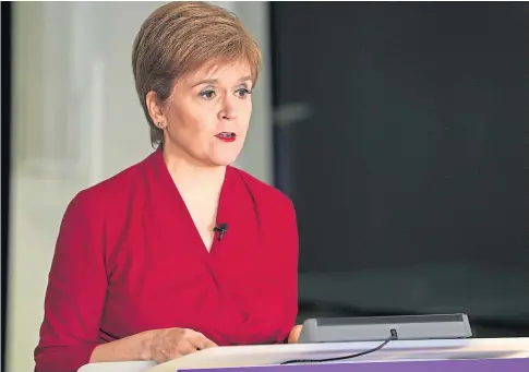  ??  ?? INSISTENT: First Minister Nicola Sturgeon said her government had to strike a balance and that they implemente­d many recommenda­tions by Sage.