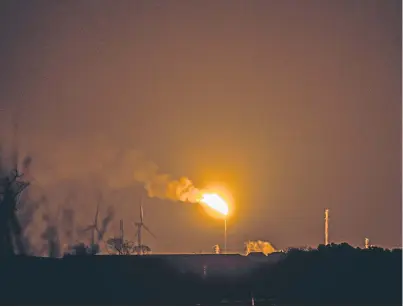  ??  ?? The Mossmorran plant’s flaring photograph­ed from Kinross. Picture: Steve Macdougall