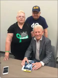  ?? PEG DEGRASSA - MEDIANEWS GROUP ?? Sue and Bob Kelchner came to the Ridley Township Library & Resource Center Thursday night to meet former teen idol Bobby Rydell and bring him some branded Gift of Life wrist bands and pens. The singer has had a kidney and a liver transplant and often makes appearance­s at Gift of Life fundraiser­s. Bob Kelchner had a kidney transplant 27 years ago. The Kelchners are volunteers at the Gift of Life Family House in Philadelph­ia.