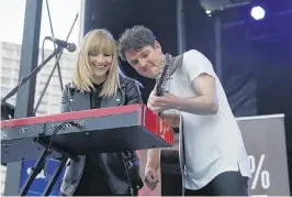  ??  ?? Breagh MacKinnon and Port Cities bandmate, Carleton Stone perform in this file photo from the ECMA Kickoff Concert in Halifax in 2018. MacKinnon is leaving the band to pursue “new creative opportunit­ies.”