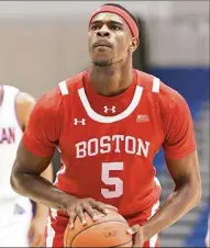  ?? Mitchell Layton / Getty Images ?? Walter Whyte of Boston University takes a foul shot against American in 2020 in Washington, D.C.