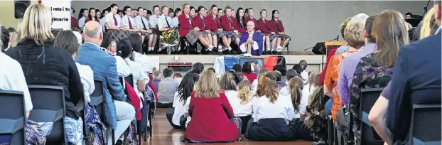  ?? PHOTO: LINDA ROBERTSON ?? Paying tribute . . . The Kavanagh College gymnasium was packed for a special Mass dedicated to principal Tracy O’Brien who died suddenly this week.