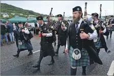  ?? ?? Mid Argyll Pipe band led the parade at this year’s Tarbert Seafood Festival.