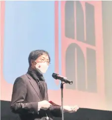 ??  ?? Director of the 22nd Jeonju Internatio­nal Film Festival Lee Joon-dong speaks before a showing of the closing movie ‘Josep,’ directed by Aurel on Saturday.