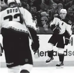  ?? BRIAN FLUHARTY/USA TODAY SPORTS ?? Coyotes right wing Clayton Keller (9) celebrates after scoring a goal against the Boston Bruins at the TD Garden.