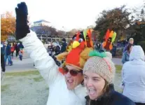  ?? STAFF FILE PHOTO BY TIM BARBER ?? Eye-catching headwear adds to the fun at the Grateful Gobbler, such as worn by Tamara Nutt, left, and Mallory Cregg at the 2017 fundraiser.