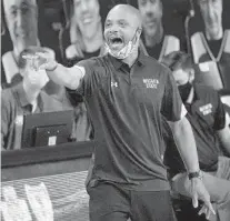  ?? SUE OGROCKI/AP ?? Wichita State removed the interim tag from coach Isaac Brown’s title Friday, agreeing in principle to a five-year deal with the longtime assistant who took a program in chaos to the top of the American Athletic Conference this season.