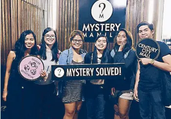  ??  ?? Game over: Tin Sartorio, Marga Buenaventu­ra, Ina Jacobe, Gaby Gloria, Maine Manalansan and Neal Corpus of Young STAR celebrate their victory after solving the Sinister Sensorium at Mystery Manila.