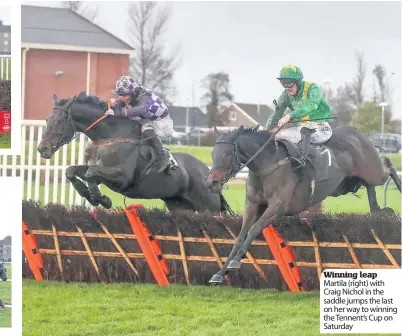  ??  ?? Winning leap Martila ( right) with Craig Nichol in the saddle jumps the last on her way to winning the Tennent’s Cup on Saturday