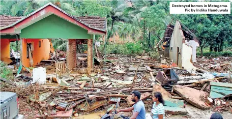  ??  ?? Destroyed homes in Matugama. Pic by Indika Handuwala