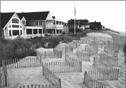  ?? DREAMSTIME ?? Houses on the Jersey Shore.