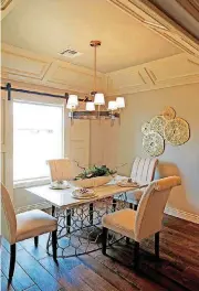  ??  ?? Dining area in the AllenStyle Homes feature entry in the Spring Parade of Homes.