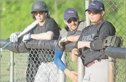 ?? JASON MALLOY/THE GUARDIAN ?? Kevin Quinn Re/Max Ravens, from left, Ty McAdam, Parker Ronahan and Logan Gallant, get a read on a pitcher during recent action in the P.E.I. Senior Men’s Fastball League.