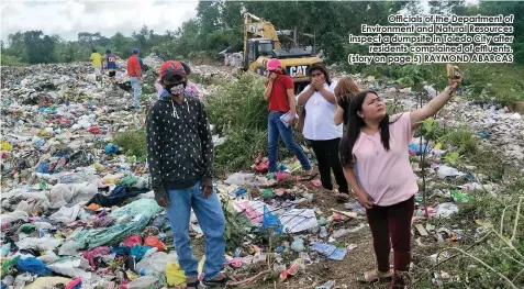  ??  ?? Officials of the Department of Environmen­t and Natural Resources inspect a dumpsite in Toledo City afterresid­ents complained of effluents. (story on page 5) RAYMOND ABARCAS