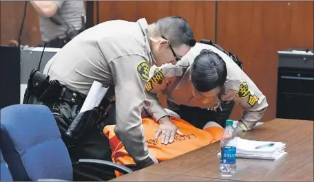  ?? Robyn Beck Getty Images ?? SINCE MARION “Suge” Knight’s arrest in 2015, the murder case took several bizarre turns. During one court hearing, Knight collapsed.