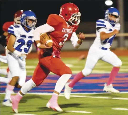  ?? Photo courtesy of Sherri Larson. ?? Estancia quarterbac­k Ja’brae Boyer, No. 3, carrying the ball during the Bears’ victory over Laguna-acoma, Oct. 8, 2021.