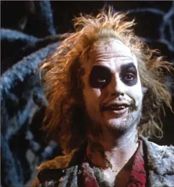  ??  ?? Michael Keaton in Beetlejuic­e. Tim Burton’s supernatur­al comedy is huge fun