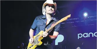  ?? JASON DAVIS/GETTY IMAGES FOR PANDORA ?? Friday the 13th proves lucky for country music fans as mega-star Brad Paisley hits the stage in the Saddledome for a concert during the Stampede.