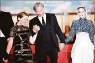  ?? Loic Venance/AFP/Getty Images/TNS ?? From left, Lea Seydoux, Viggo Mortensen and Kristen Stewart leave the Festival Palace after the screening of the film “Crimes Of the Future” during the 75th edition of the Cannes Film Festival in Cannes, southern France, on May 23.