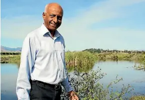  ?? PHOTO: OLIVER LEWIS/FAIRFAX NZ ?? Delegat’s Wine Estate grower business developmen­t manager Rengasamy Balasubram­aniam at the Fault Lake wetland.