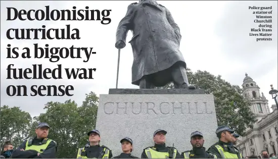  ?? PHOTO: GETTY IMAGES ?? Police guard a statue of Winston Churchill during Black Trans Lives Matter protests