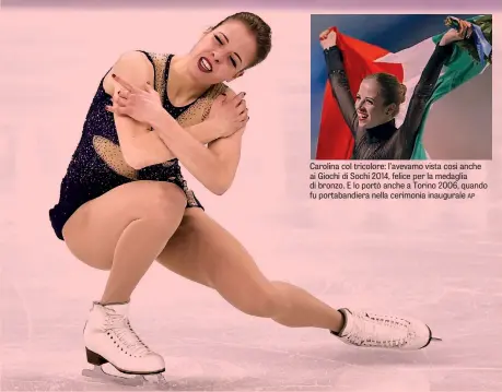  ?? LAPRESSE ?? Carolina col tricolore: l’avevamo vista così anche ai Giochi di Sochi 2014, felice per la medaglia di bronzo. E lo portò anche a Torino 2006, quando fu portabandi­era nella cerimonia inaugurale AP Carolina Kostner, 31 anni, durante l’ultima esibizione a...