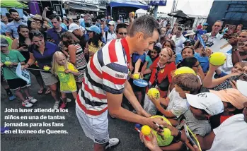  ?? /CORTESIA USTA ?? John Isner atiende a los niños en una de tantas jornadas para los fans en el torneo de Queens.