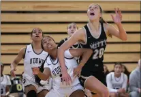  ?? ?? Archbishop Mitty forward McKenna Woliczko boxes out a Bishop O'Dowd player during a girls basketball game at the Martin Luther King Jr. Day Showcase in Oakland on Jan. 16. Mitty defeated host O'Dowd, 61-31.